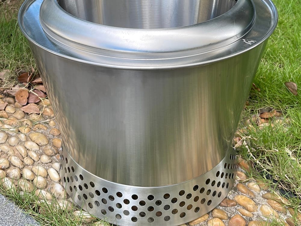 304 stainless steel smokeless fire pit — brushed exterior, two-piece bowl design and perforated air intake base